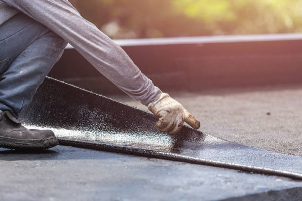 Professional Exterior Waterproofing technician working in Quincy, IL